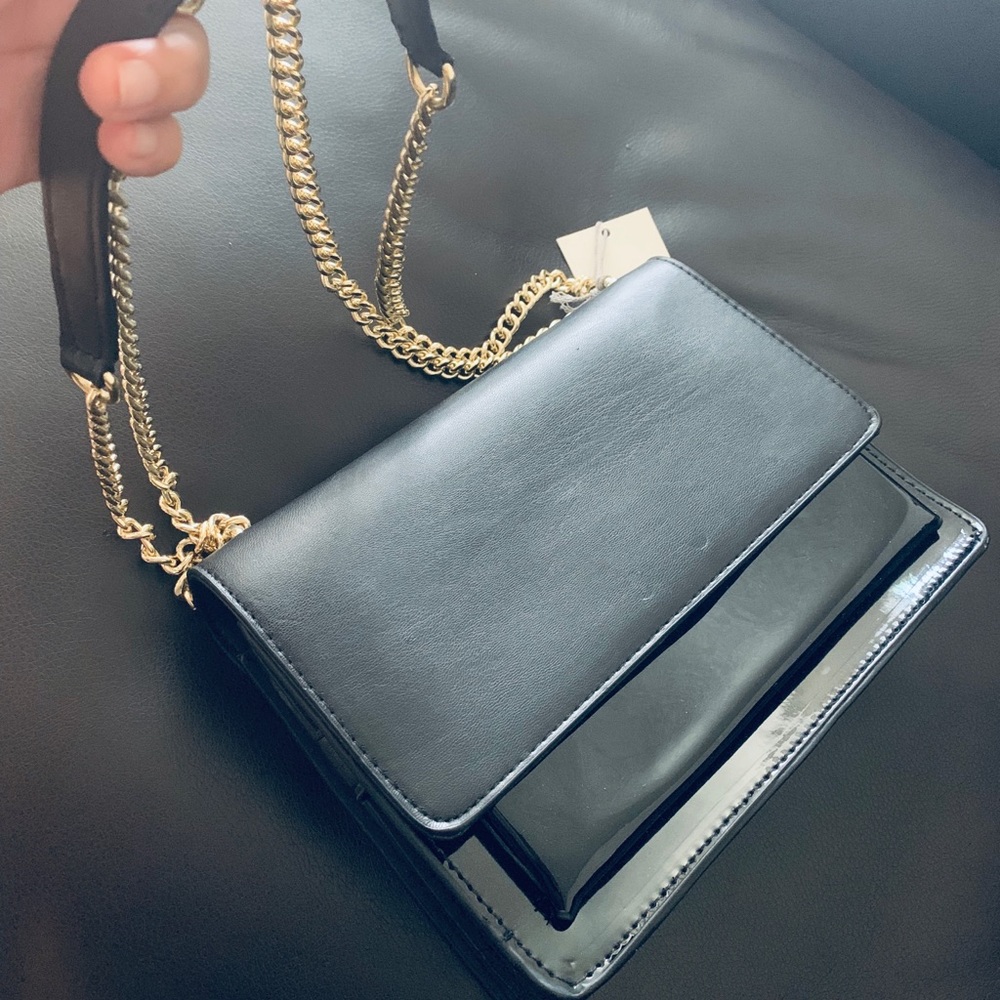 Black satchel bag with gold chain